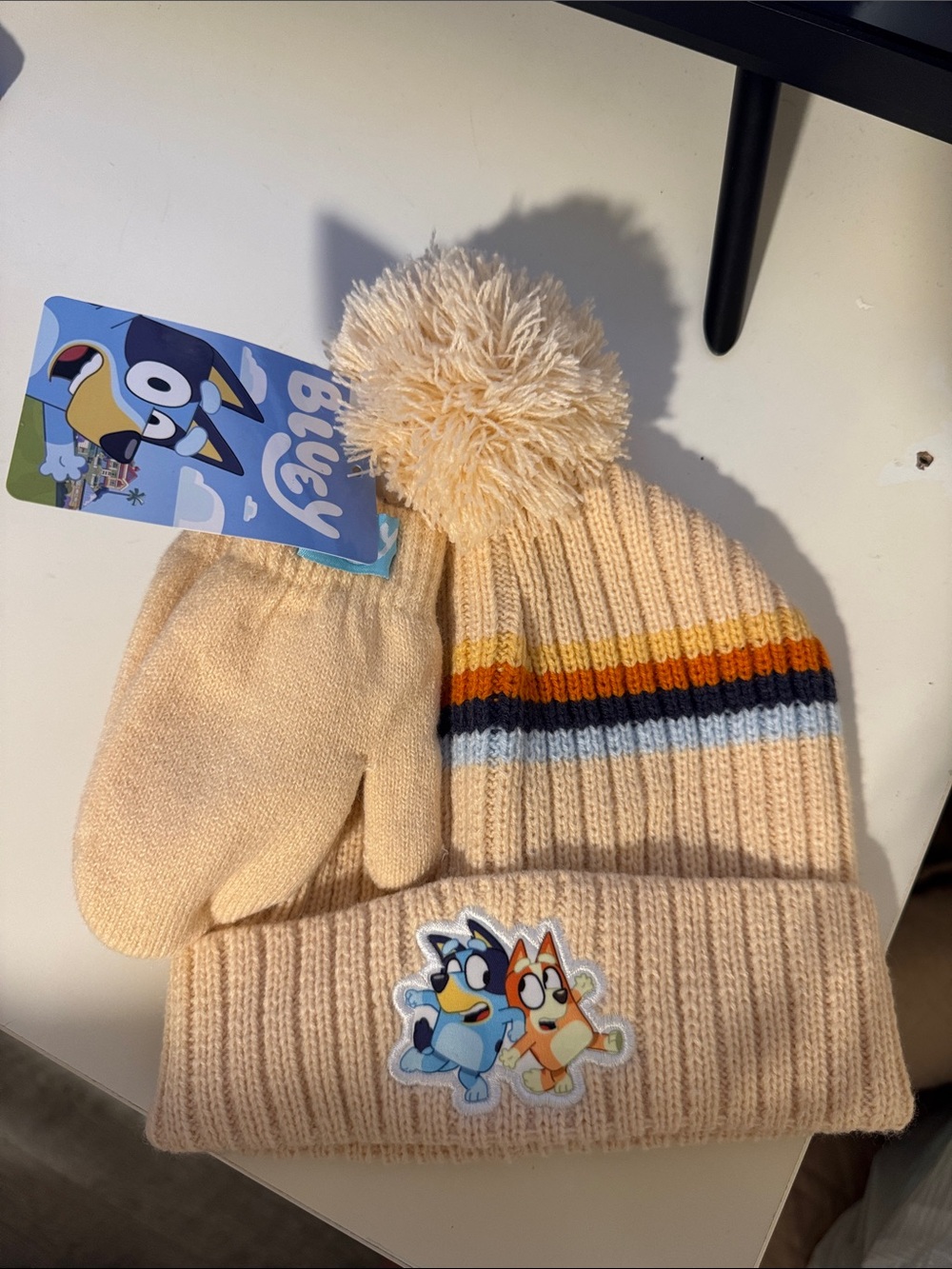 Berkshire Cream Pom Beanie with Stripe Detail and Character Patch